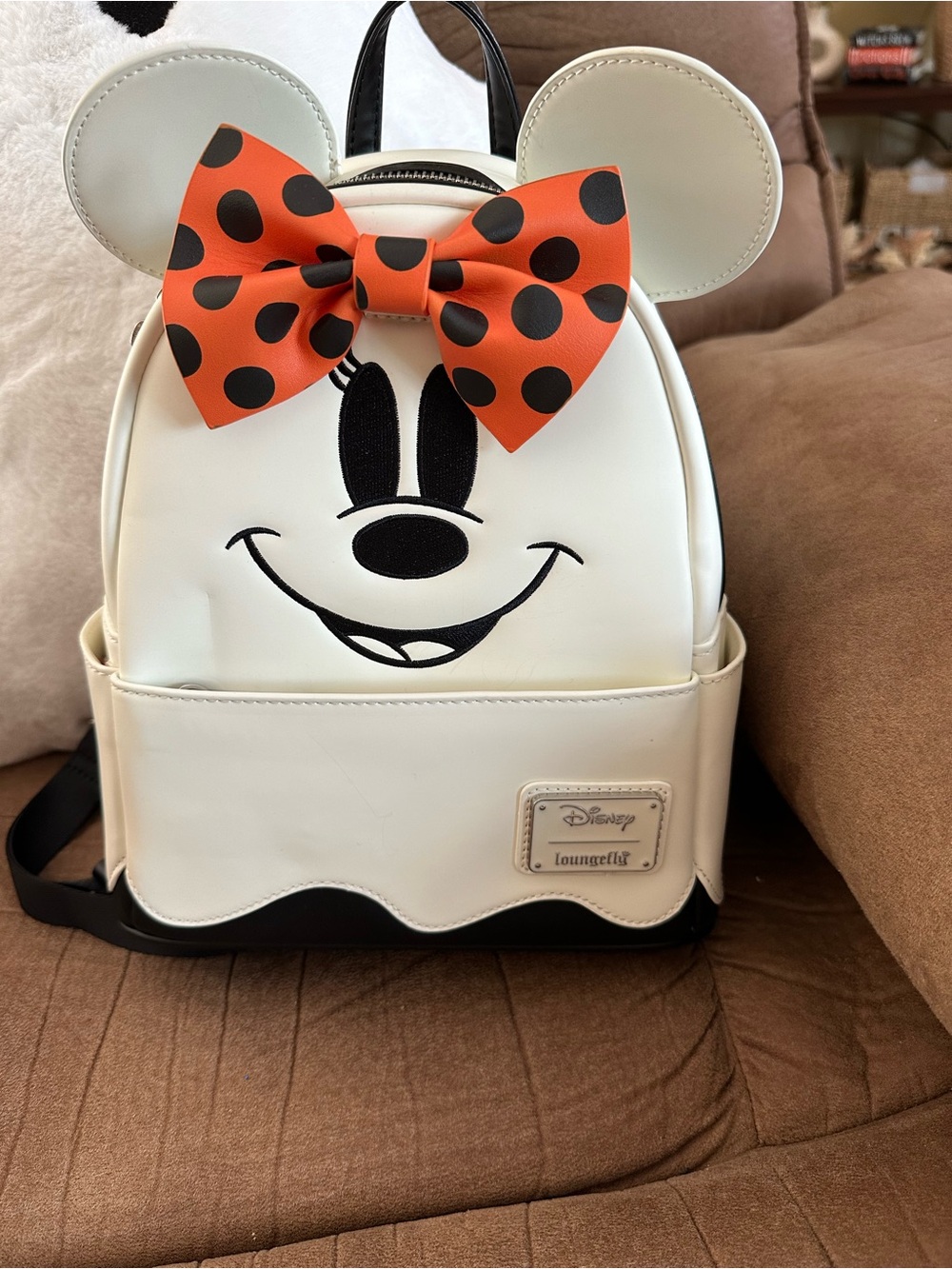 Loungefly Cream Minnie Backpack with Orange Polka Dot Bow Glow in the Dark. - Picture 2 of 5